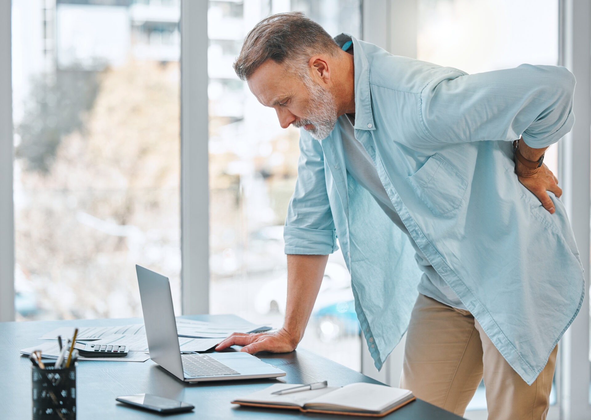 what causes spine pain